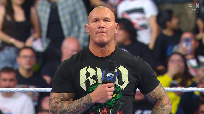 Orton about to speak on the microphone